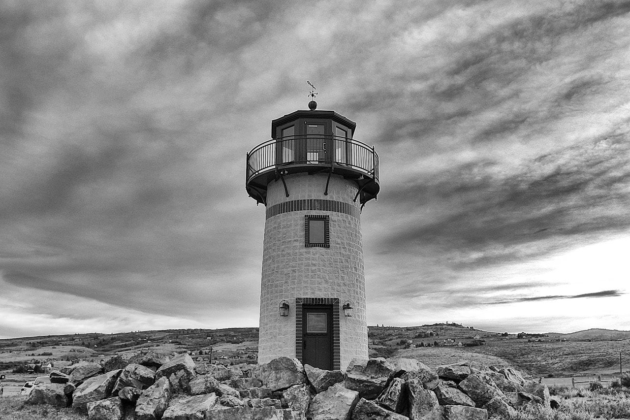greyscale photography of lighthouse